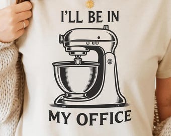 May include: Beige t-shirt with a black graphic of a stand mixer and the text "I'LL BE IN MY OFFICE". The shirt also has the text "SVG + PNG | 9 COLORS | 300 DPI | COMMERCIAL USE".