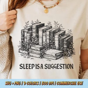 May include: Beige t-shirt with a black and white illustration of stacked books and foliage. The text "SLEEP IS A SUGGESTION" is below the illustration. The shirt also has the text "SVG + PNG | 9 COLORS | 300 DPI | COMMERCIAL USE".