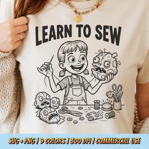 May include: Beige t-shirt with the text "LEARN TO SEW" above a cartoon illustration of a girl sewing a zombie head. The image includes sewing tools like scissors, thread, and a pincushion. The bottom of the shirt has text that reads "SVG + PNG | 9 COLORS | 300 DPI | COMMERCIAL USE".