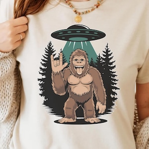 Bigfoot And UFO PNG - Funny Alien Encounter Digital Design, Rock On Sasquatch Sublimation Graphic, Sasquatch Art, UFO Alien, T-Shirt Design