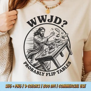 May include: Beige t-shirt with a black and white graphic of Jesus flipping a table, surrounded by food. The text "WWJD? PROBABLY FLIP TABLES" is in a circular design. The bottom of the shirt has the text "SVG + PNG | 9 COLORS | 300 DPI | COMMERCIAL USE."