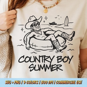 May include: A beige t-shirt with a black graphic of a cowboy relaxing in a tube at the beach. The text "COUNTRY BOY SUMMER" is below the illustration. The shirt also has the text "SVG + PNG | 9 COLORS | 300 DPI | COMMERCIAL USE".