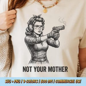May include: Beige t-shirt featuring a black and white illustration of a woman holding a gun, wearing safety glasses and earmuffs. The text "NOT YOUR MOTHER" is printed below the illustration. The bottom of the shirt has text that reads "SVG + PNG | 9 COLORS | 300 DPI | COMMERCIAL USE".