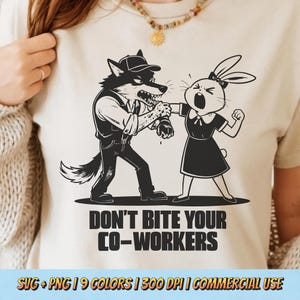 May include: Beige t-shirt with a black and white graphic of a wolf biting a rabbit, with the text "DON'T BITE YOUR CO-WORKERS". The design includes the text "SVG + PNG | 9 COLORS | 300 DPI | COMMERCIAL USE".
