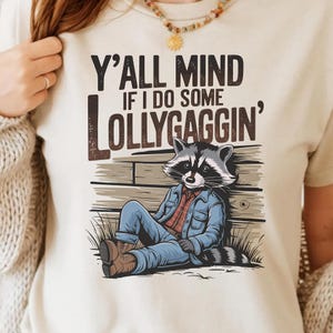 Y&#39;all Mind If I Do Some Lollygaggin PNG - Funny Retro Cowboy Raccoon Country Meme Western Humor Design Sarcastic Feral Clipart Shirt Design