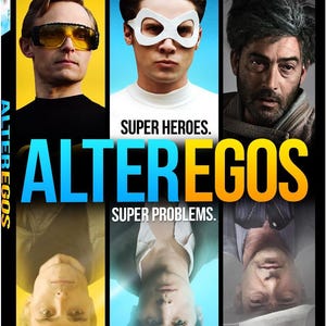 Op de afbeelding: DVD-hoes voor "Alter Egos" met drie mannen met verschillende looks, waaronder een met een wit masker. De titel staat in grote blauwe en witte letters, met de slogan "Super Heroes. Super Problems."