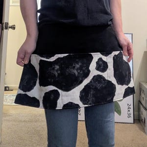 Cow Print Half Apron with Black Waistband – Fun & Stylish Utility Apron for Cooking, Crafting, Gardening – Unisex Animal Print Waist Apron