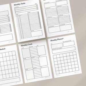 May include: A collection of white paper sheets with black printed text, featuring layouts for monthly planning. The sheets include sections for tasks, goals, and schedules. The text includes the words "Monthly Planner", "Monthly Tasks", "Monthly Goals", and "Monthly Schedule".