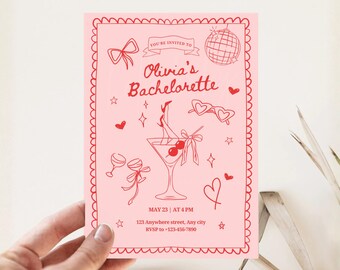 May include: Pink bachelorette party invitation with red illustrations. The invitation features a cocktail glass, heart-shaped sunglasses, and the text "Olivia's Bachelorette." The date and time are also included.