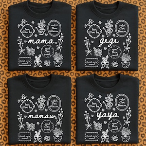 May include: Four black sweatshirts with white floral designs and text. Each shirt has a different name: "mama", "gigi", "mamaw", and "yaya". The designs include phrases like "love them big" and "cherish every moment".