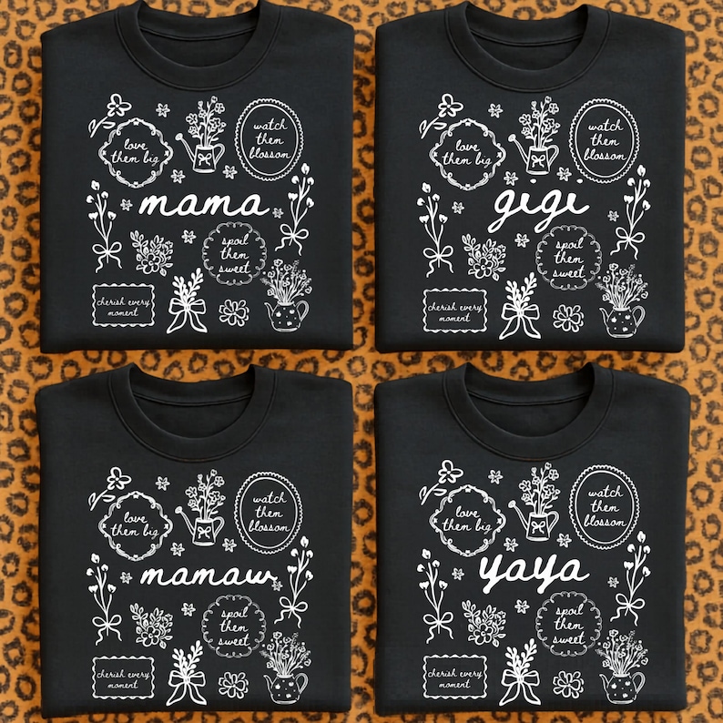 May include: Four black sweatshirts with white floral designs and text. Each shirt has a different name: "mama", "gigi", "mamaw", and "yaya". The designs include phrases like "love them big" and "cherish every moment".