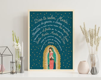 May include: A teal blue printable art print with gold lettering and a stylized image of the Virgin Mary. The text reads "Dios te salve, Maria, Llena eres de gracia, el Señor es contigo. Bendita tu eres entre todas las mujeres y bendito es el fruto de tu vientre, Jesus. Santa Maria, Madre de Dios, ruega por nosotros, pecadores, y en la hora de nuestra muerte. Amen."