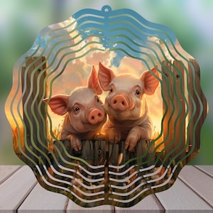 May include: Two piglets peek over a wooden fence, with a sunset sky and clouds in the background. The metal wind spinner is designed with a swirling pattern.