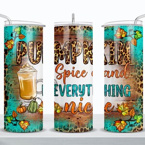 May include: A set of three stainless steel tumblers with a fall-themed design. The tumblers feature a teal background with a woodgrain pattern, a leopard print, and the text "Pumpkin Spice and Everything Nice".