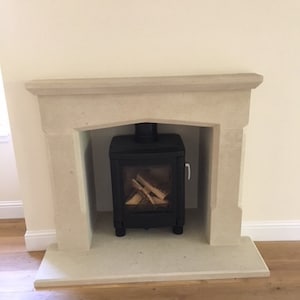 limestone fireplace hand carved