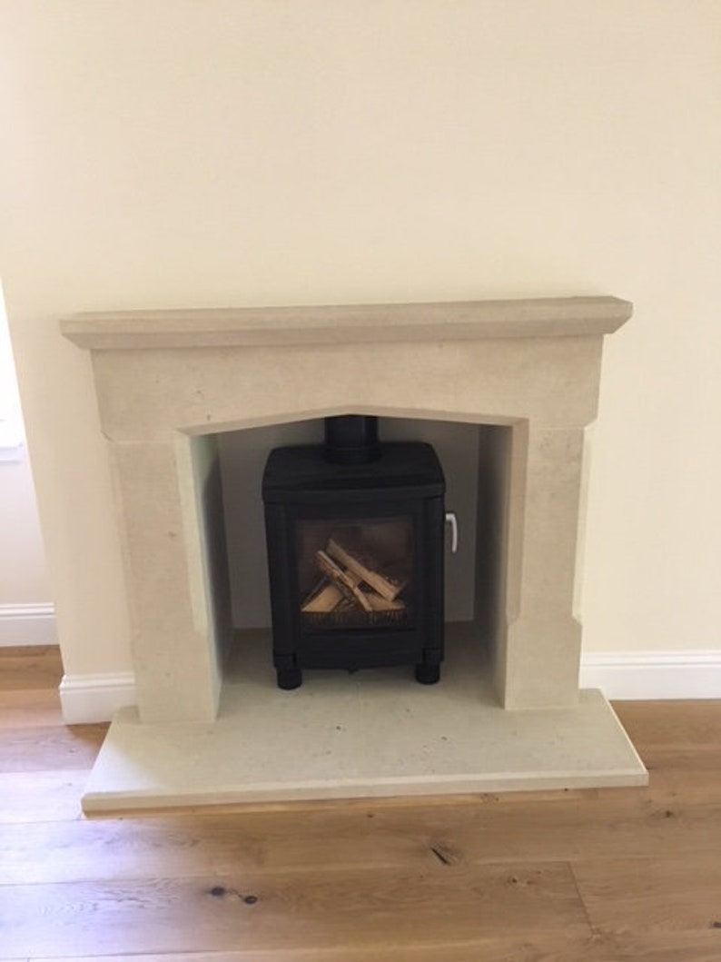 limestone fireplace hand carved