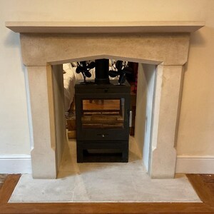hand carved stone fireplace