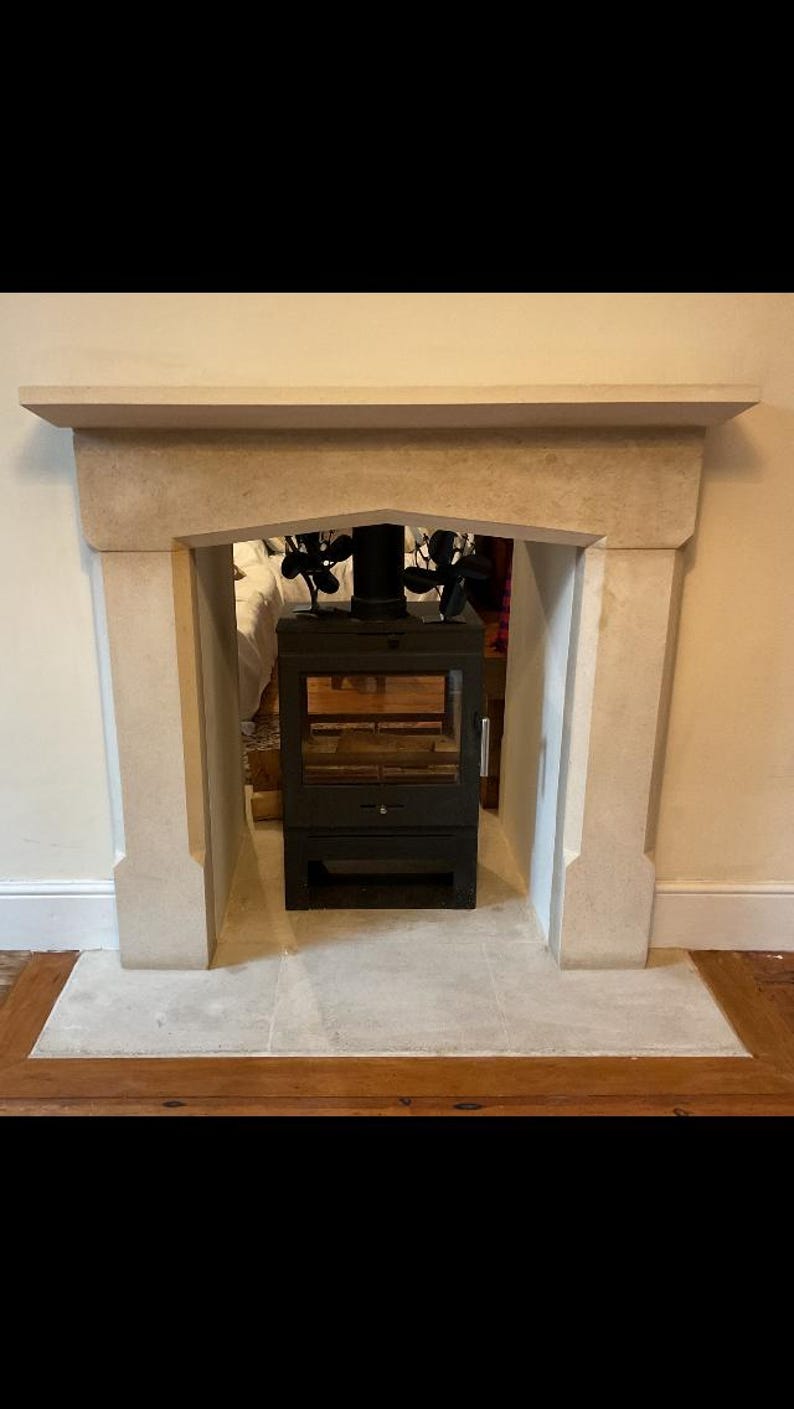 hand carved stone fireplace