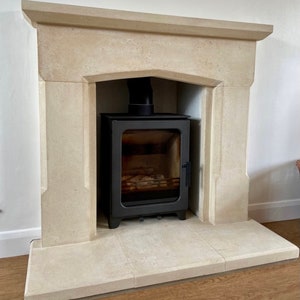 stone fireplace carved from solid Bath stone.  made to measure