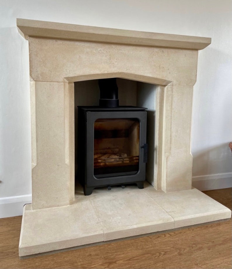 stone fireplace carved from solid Bath stone.  made to measure