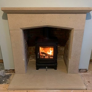 hand carved Bath stone fireplaces and hearths