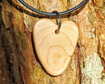 Handmade wooden heart necklace.