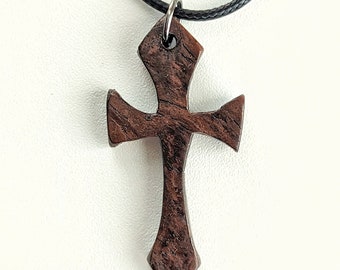 Handmade wooden cross necklace.