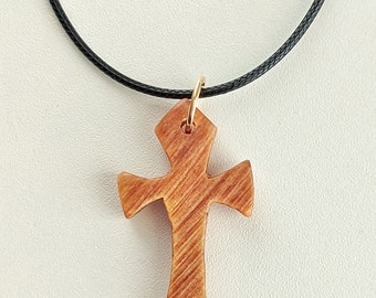 Handmade wooden cross necklace.