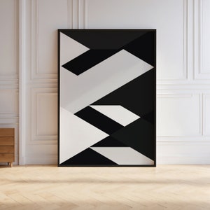 May include: Black and white abstract geometric art print in a black frame. The print features a series of overlapping shapes in a modern style.