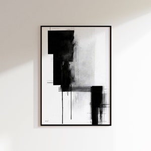 Könnte beinhalten: Abstrakter Schwarzweiß-Kunstdruck mit geometrischen Formen und Linien. Der Druck ist in einem schwarzen Rahmen gerahmt.