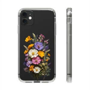 May include: A clear phone case with a black background and a bouquet of pressed flowers in shades of yellow, orange, pink, purple, and white.