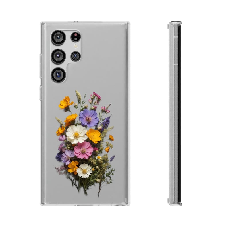 May include: A clear phone case with a floral design. The case features a bouquet of pressed flowers in shades of yellow, orange, pink, purple, and white. The case is designed for a Samsung Galaxy S21 Ultra.
