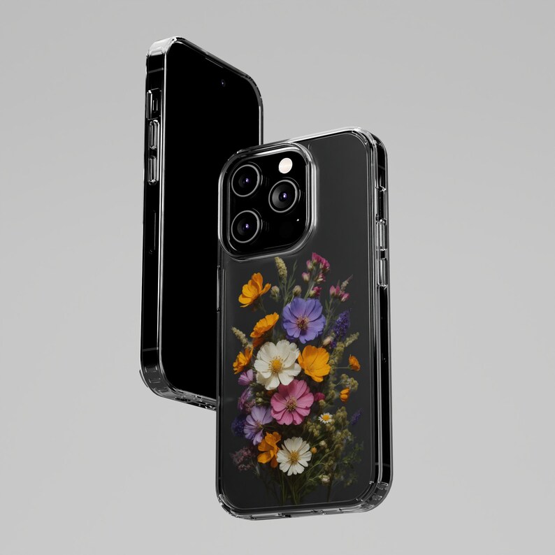 May include: A clear phone case with a floral design. The case features a bouquet of pressed flowers in shades of pink, purple, yellow, and orange.