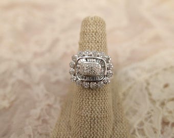 Anello in oro bianco 14 carati e diamanti