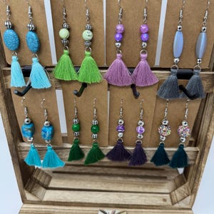 Earrings tassel with beads hand made different colors.