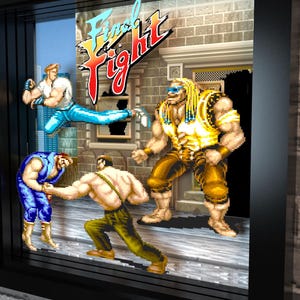 May include: A 3D shadow box art piece featuring the Final Fight video game logo and pixelated characters in a street scene. The display includes a character jumping, two characters fighting, and a large opponent, all encased in a black frame.