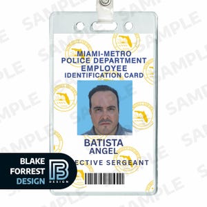 May include: A Miami-Metro Police Department employee identification card in a clear plastic holder. The card features a photo of a man, the name "BATISTA ANGEL", and the title "DETECTIVE SERGEANT". The card also includes a barcode and the Blake Forrest Design logo.