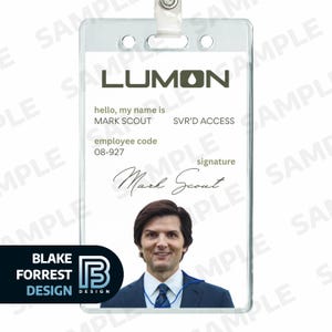 May include: Clear plastic employee ID badge featuring the Lumon logo and the name Mark Scout. The badge includes an employee code, signature, and a photo of a man in a suit. The bottom left corner has the Blake Forrest Design logo.