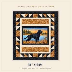 May include: A Black Lab Panel Quilt Pattern featuring a central image of a black Labrador retriever in a grassy field by a lake at sunset. The quilt has a border of black and orange patterned fabric with triangular accents, measuring 58 inches by 64.5 inches.