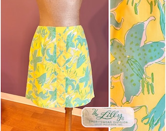 Falda vintage de los 70 de Lilly Pulitzer, modelo The Lilly, color amarillo brillante y verde azulado con estampado de lirios, con bolsillo, talla XS.