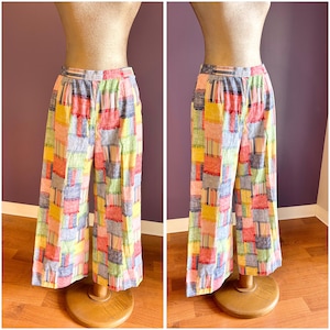 Urocze, tęczowe, patchworkowe spodnie z wysokim stanem w stylu vintage z lat 70., rozmiar S