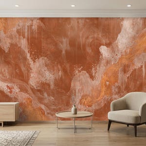 May include: A wall mural featuring an abstract design with swirling patterns of burnt orange, terracotta, and cream. The surface displays layered textures, vertical drip effects, and faint circular motifs across the entire wall covering.