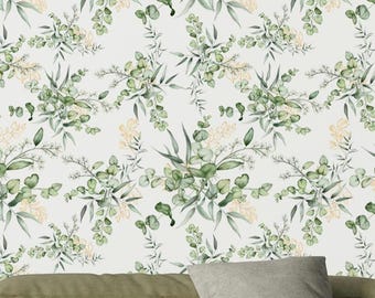May include: A seamless pattern featuring a repeating design of green leaves and white flowers on a white background.