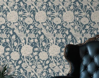 May include: Wallpaper featuring a repeating botanical pattern of cream-colored flowers and foliage set against a deep slate blue background. The design includes intricate floral motifs and leafy stems that create a dense, continuous visual texture.