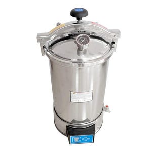 May include: A stainless steel autoclave with a pressure gauge, a handle, and a digital control panel. The autoclave is used for sterilizing medical instruments.
