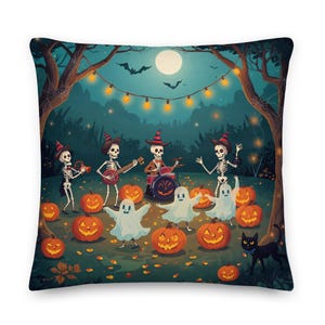 May include: Square decorative pillow featuring a Halloween scene. A skeleton band plays music in a forest with pumpkins, ghosts, and a black cat. The background includes a full moon and string lights.