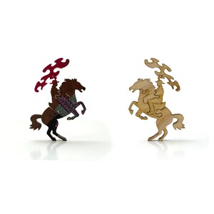May include: Two wooden horse and rider puzzles, one with a natural wood finish and the other with a colorful painted design. The puzzles are made of interlocking pieces and are designed to be assembled.
