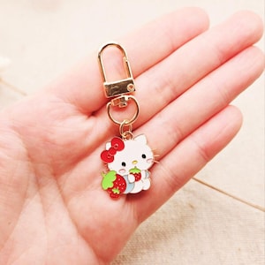 Kitty-sleutelhanger: aardbeikat bedel, kraagaccessoire
