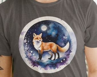 May include: A dark gray t-shirt with a circular design featuring a fox standing in a moonlit forest scene. The fox is orange and white, and the forest is depicted with purple and blue watercolor washes.