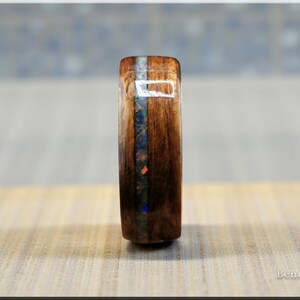 Bentwood Ring: Quartersawn Mozambique, offset inlaid Ethiopian Opal, Tungsten Carbide core, wood ring